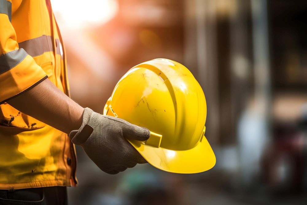 highly-visible-safety-gear-closeup-person-wearing-hard-hat-gloves-generative-ai